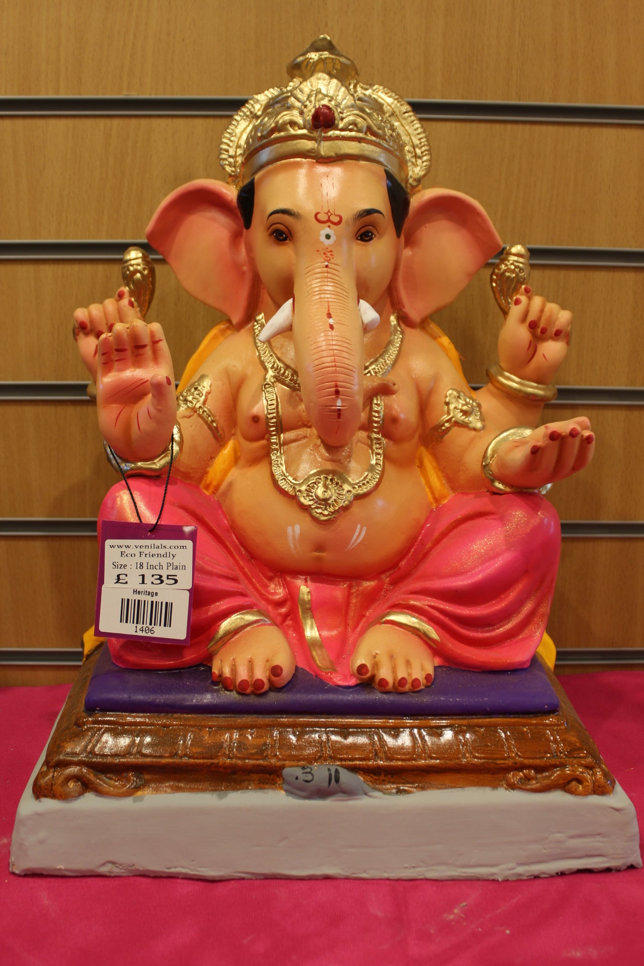 18 inch eco-friendly Ganesh idol – saffron khes and rani pink dhoti on carved chowki, front