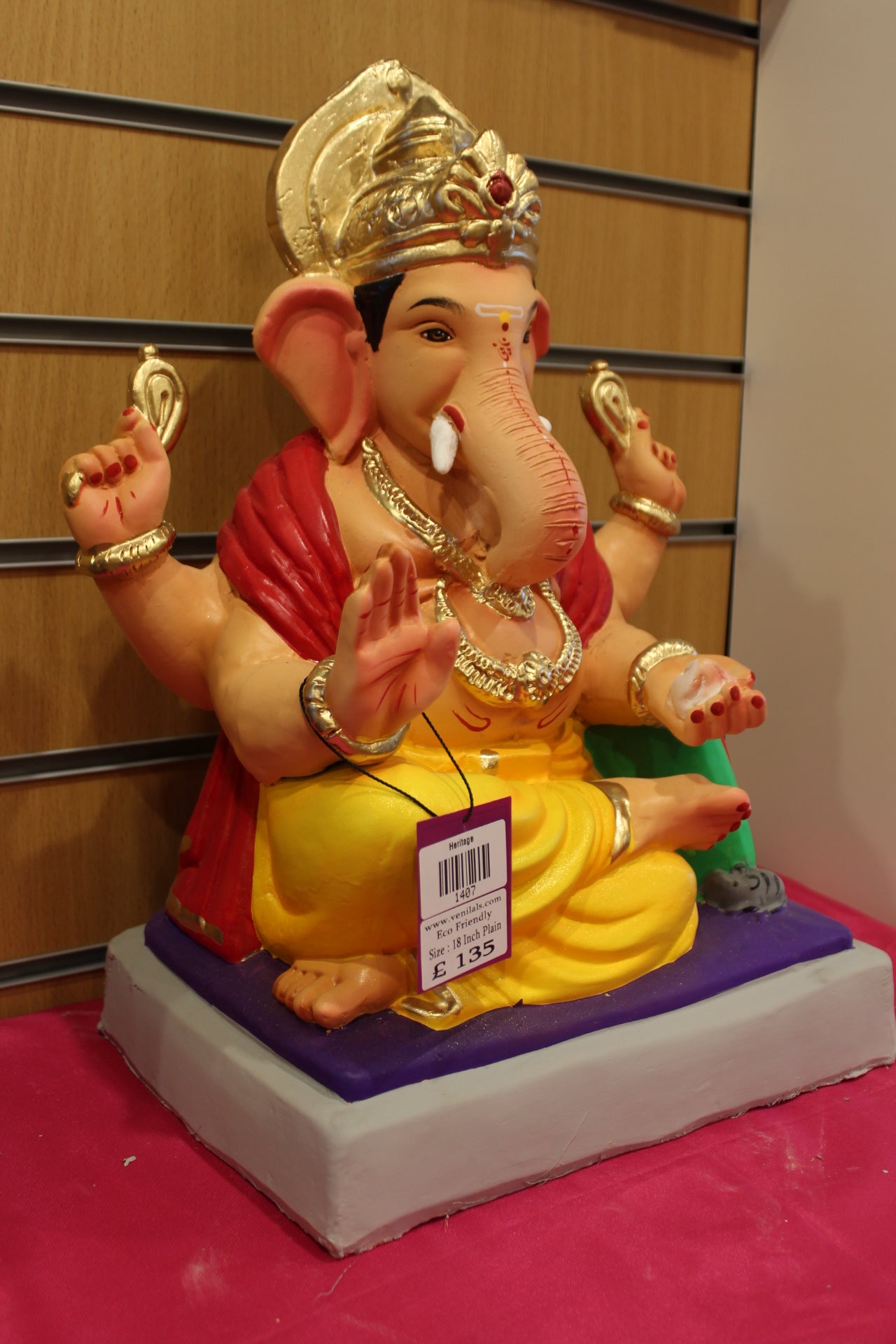 Side view – red khes and yellow dhoti with green bolster