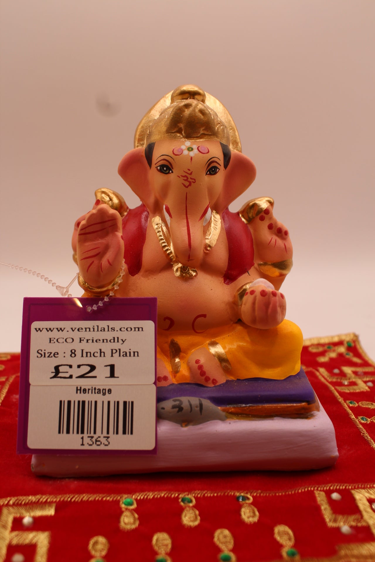 6 inch eco-friendly Ganesh idol, four-armed, marigold dhoti and maroon khes, front
