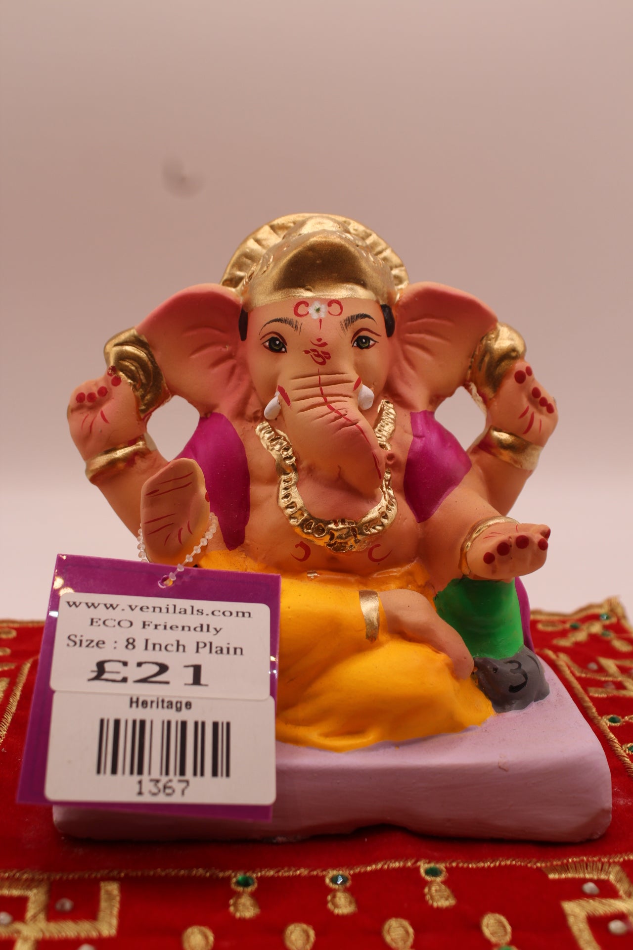 6 inch eco-friendly Ganesh idol with rayed sun-disc crown, front