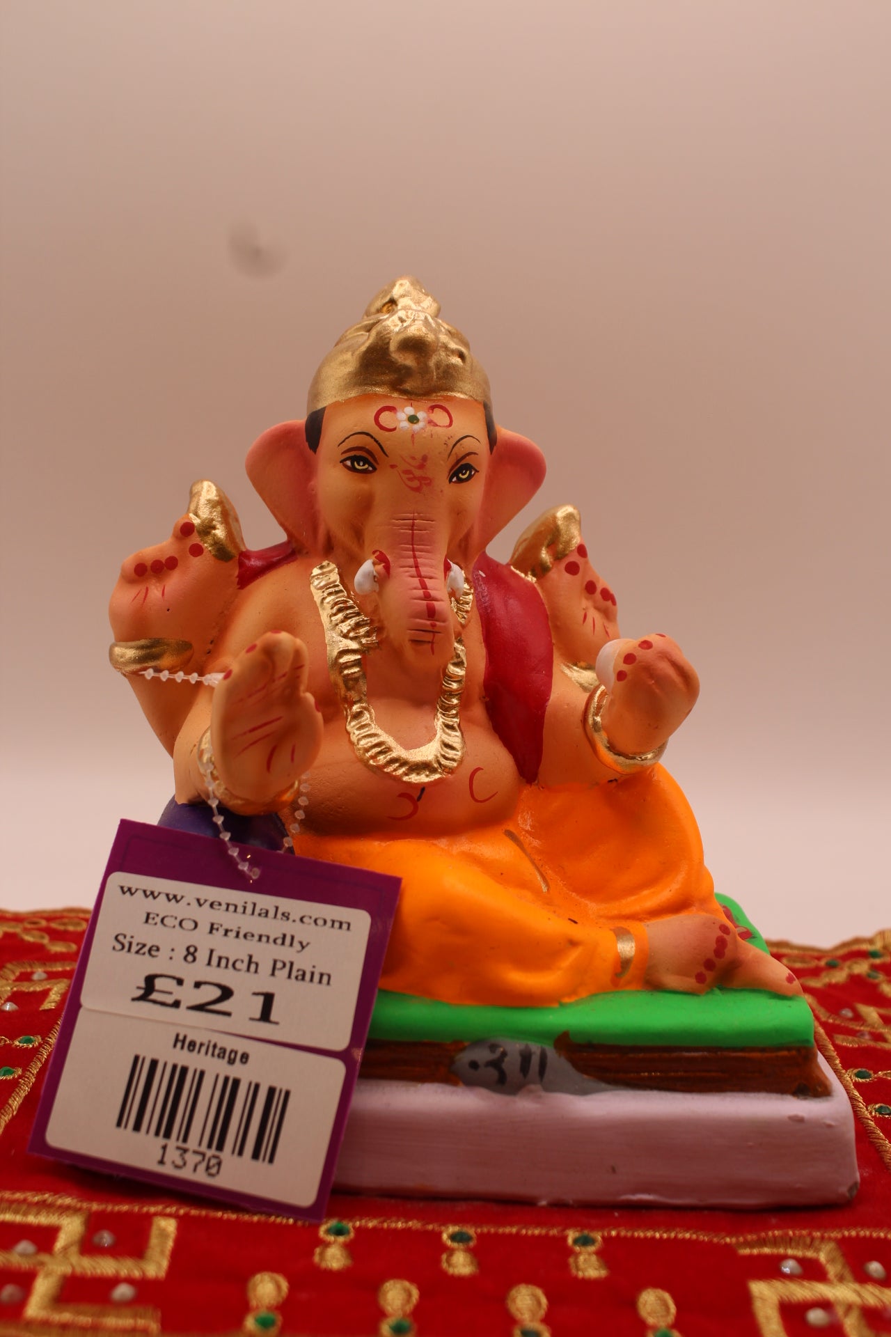 6 inch eco-friendly Ganesh idol with pointed spiral crown, front