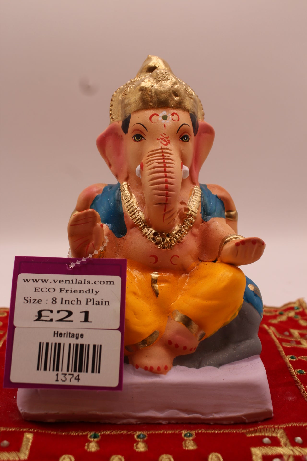 6 inch eco-friendly Ganesh idol with teal khes on the mushak, front