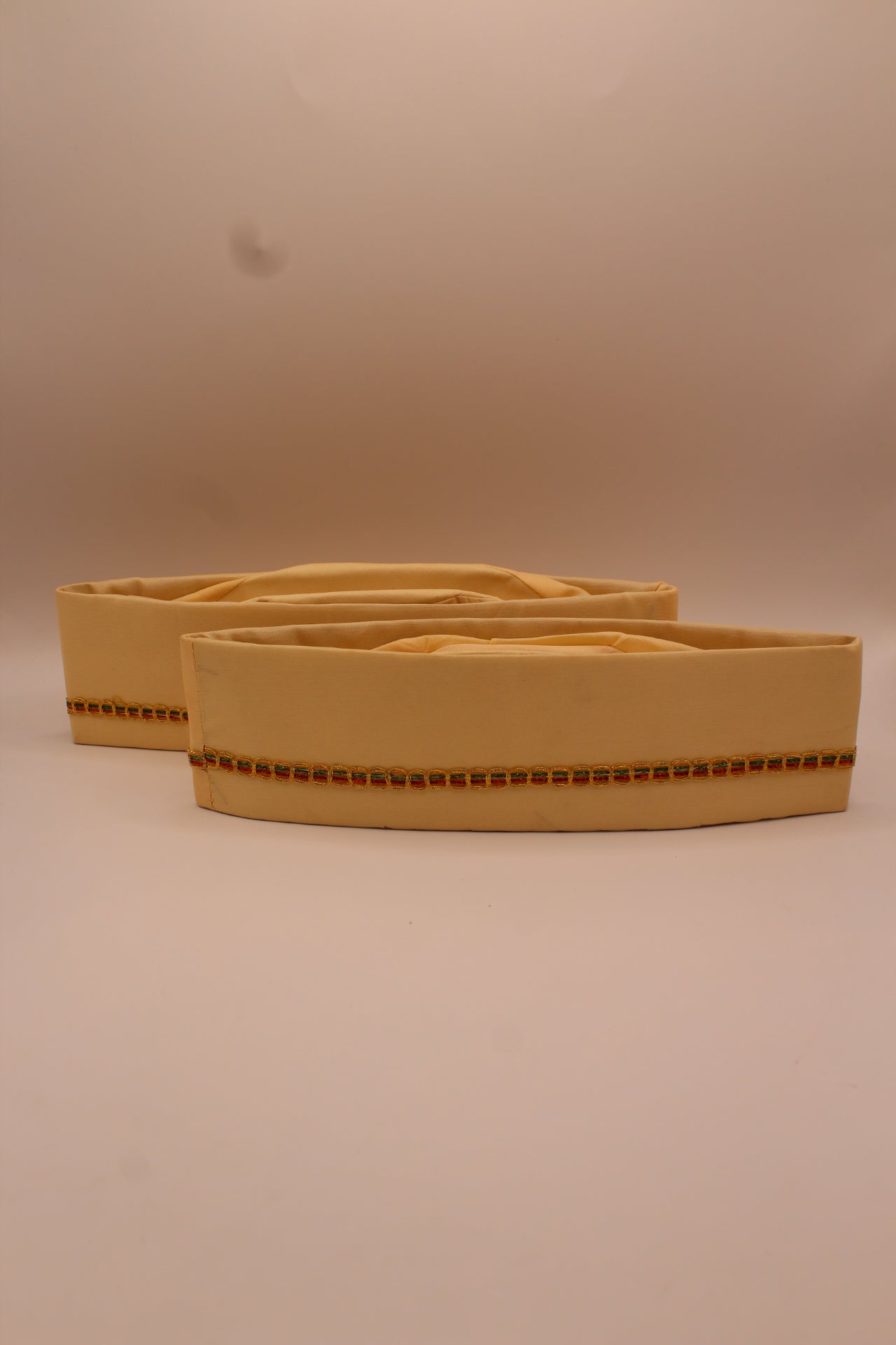 Cream Gandhi topi with gold braid trim, detail of braid