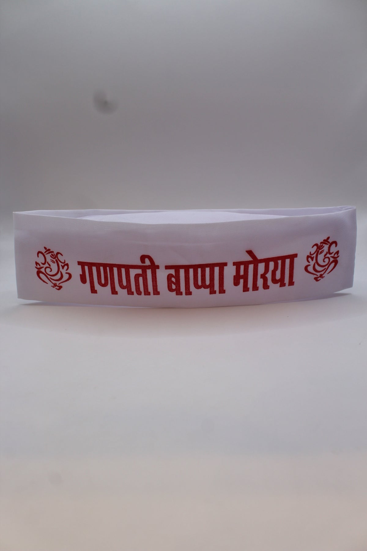 Gandhi topi with Ganpati Bappa Morya print, front view