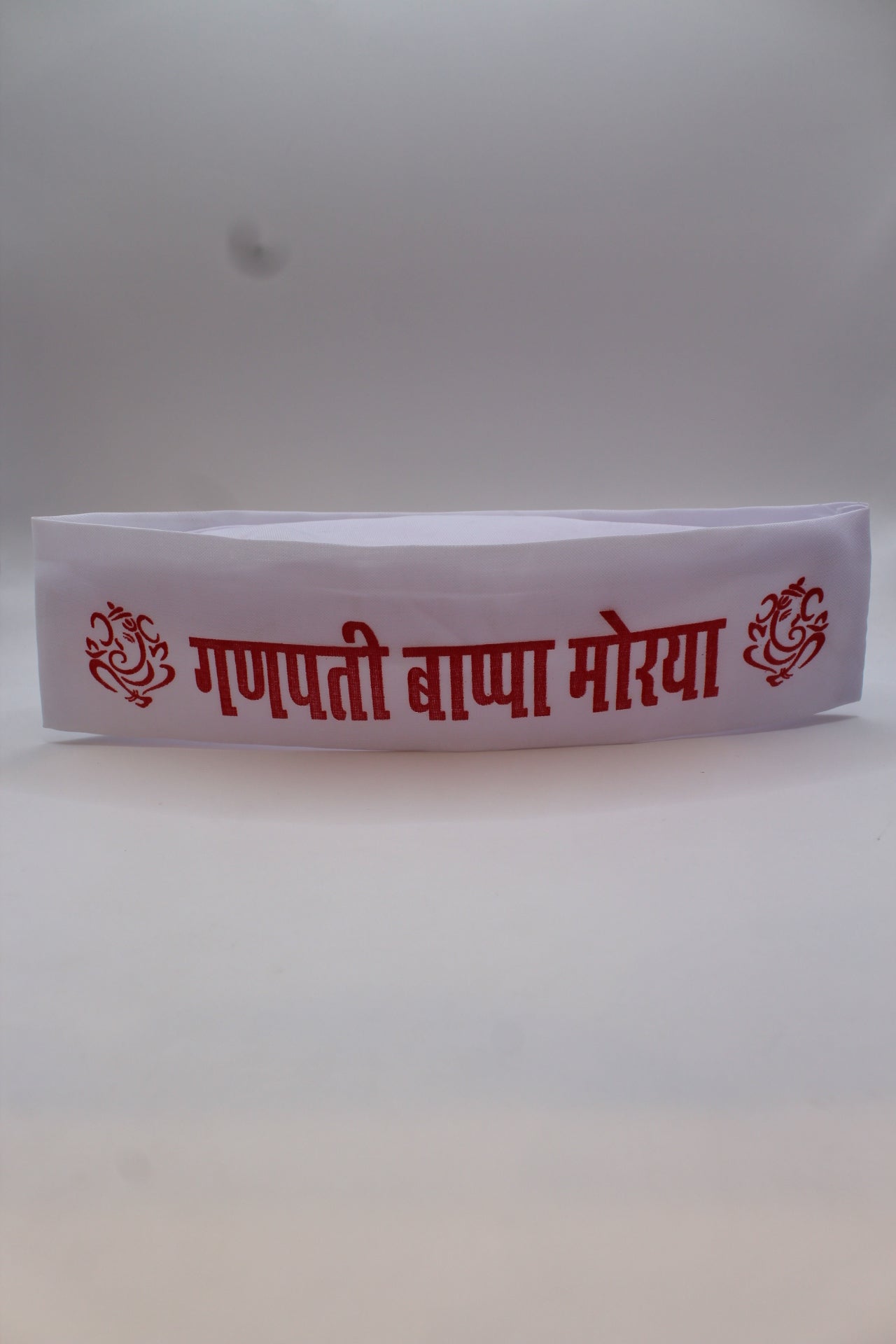 Gandhi topi with Ganpati Bappa Morya print, front view