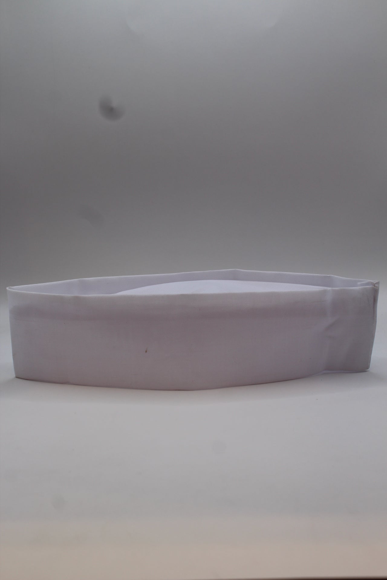 White Gandhi topi, front view
