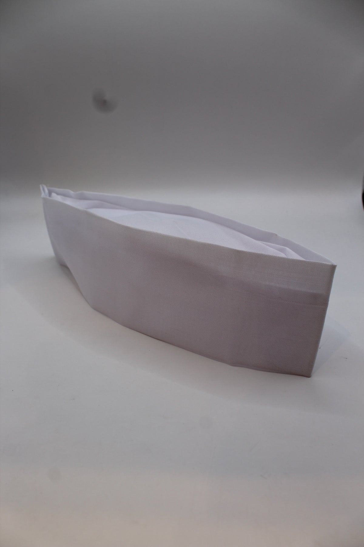 White Gandhi topi, side view
