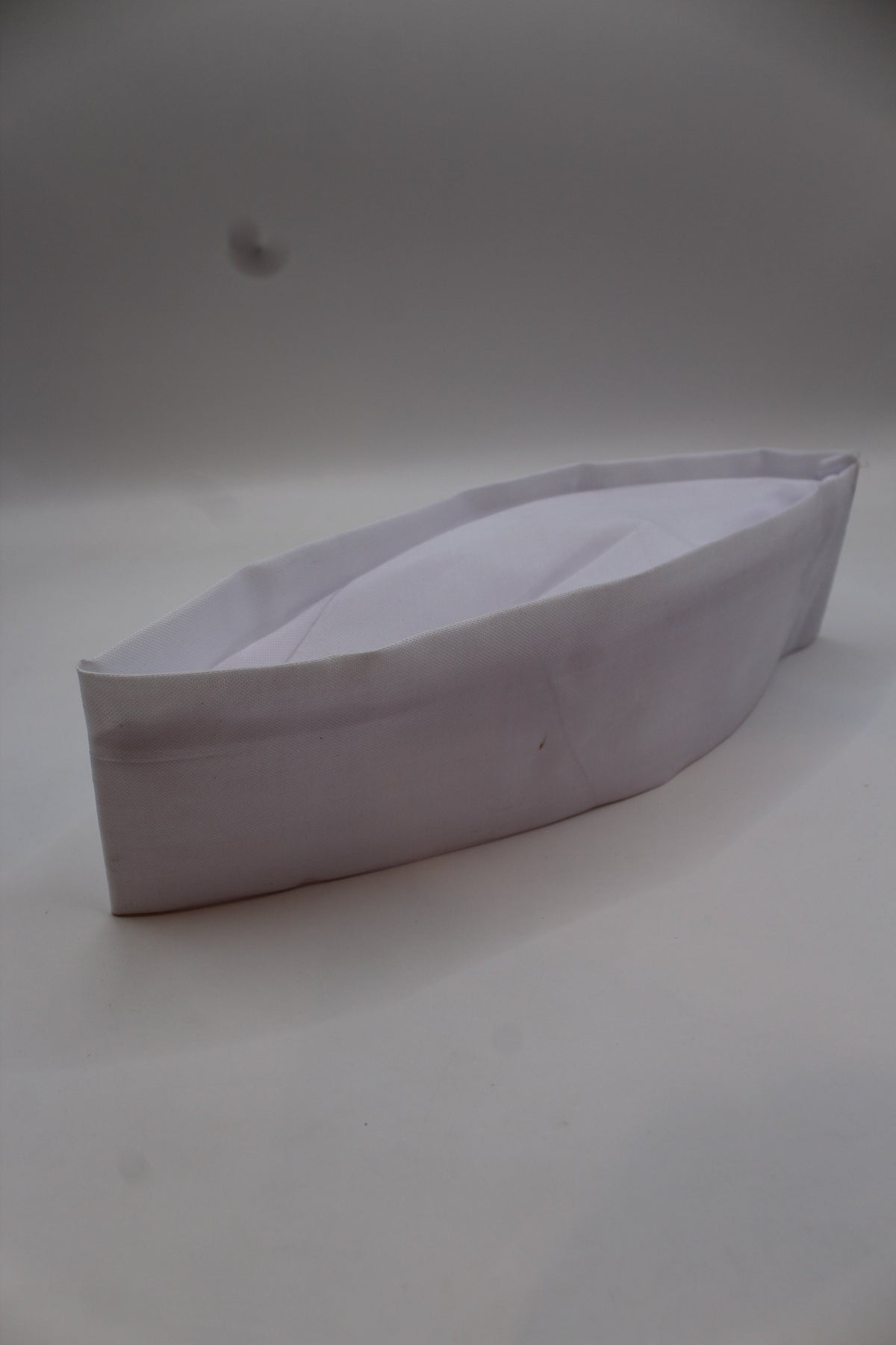 White Gandhi topi, top view