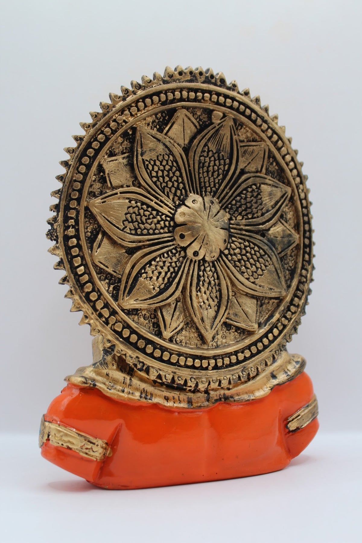 Orange resin Hanuman bust with gold crown, back view