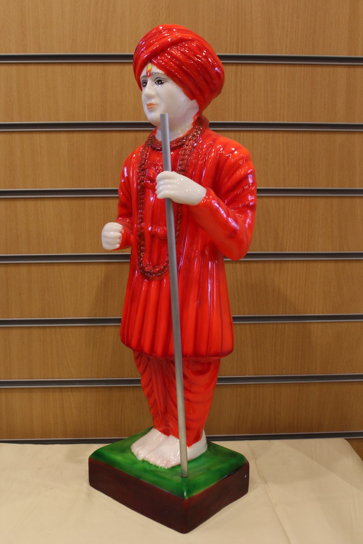 Resin/Fibre Jalaram Bapa Statue for Home Temple – Red Robe with Staff, 24 inch – right side view