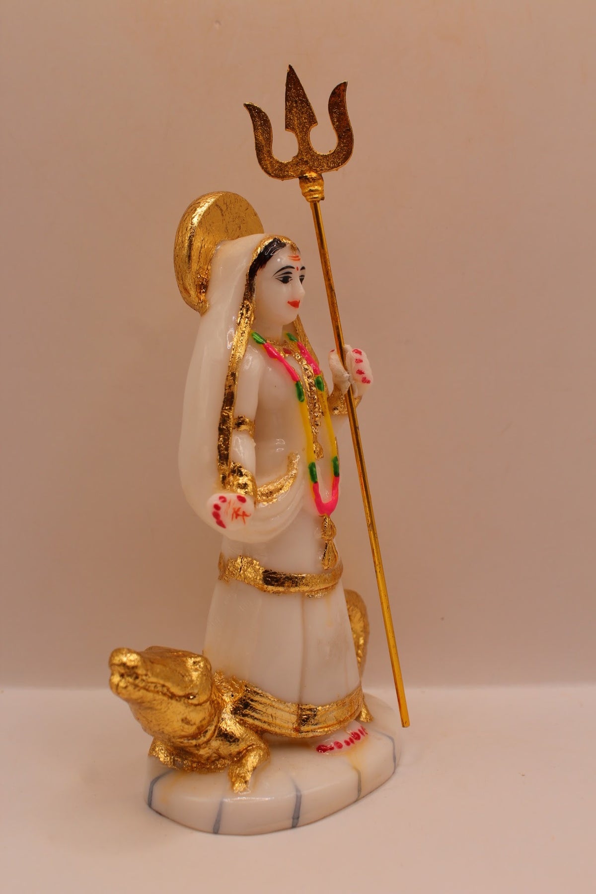 Resin Khodiyar Maa murti standing on a crocodile, left side view