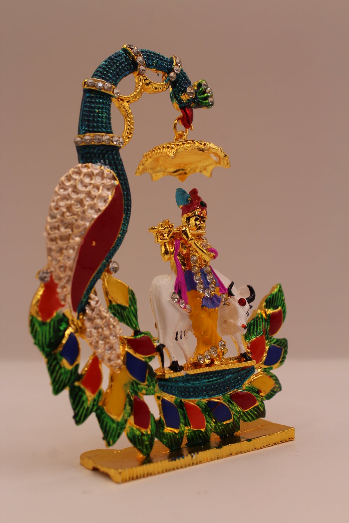 Krishna with Cow Murti – Peacock Arch, Colourful Metal, 4.5 inch – left side view