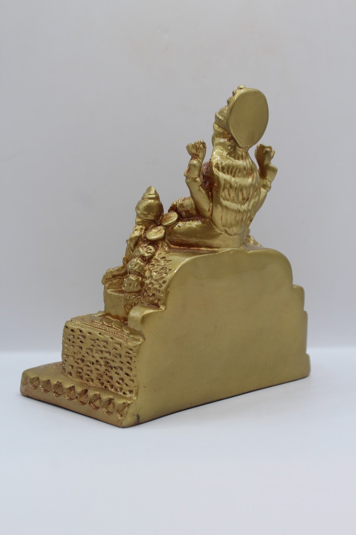 Gold resin Laxmi Kuber murti with coins, back view