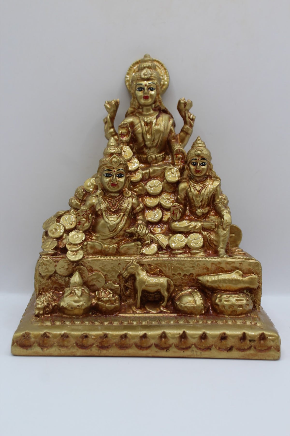 Gold resin Laxmi Kuber murti with coins, front view