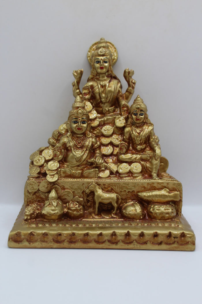Gold resin Laxmi Kuber murti with coins, front view