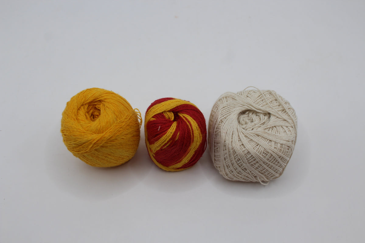 Three cotton mauli kalawa thread rolls