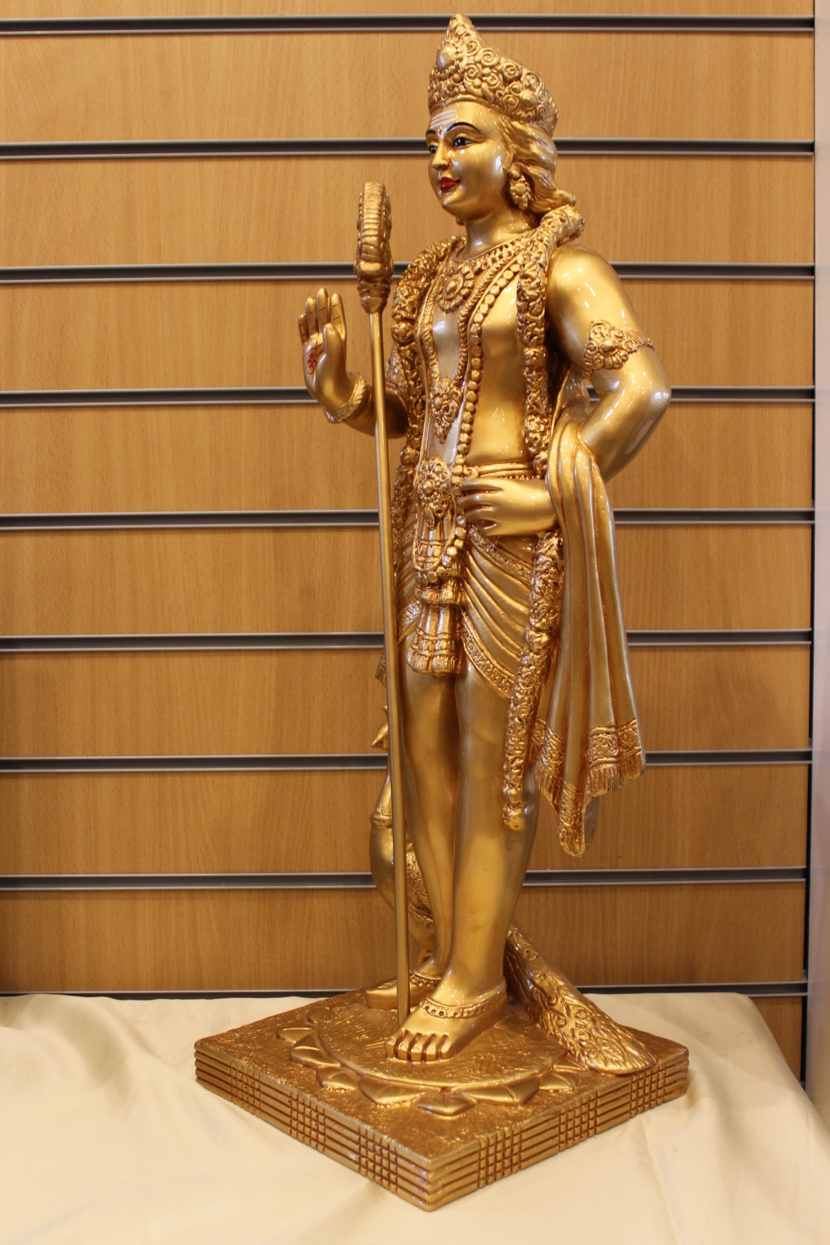 Resin Murugan Statue – Standing with Vel and Peacock, Gold, 29 inch – right side view