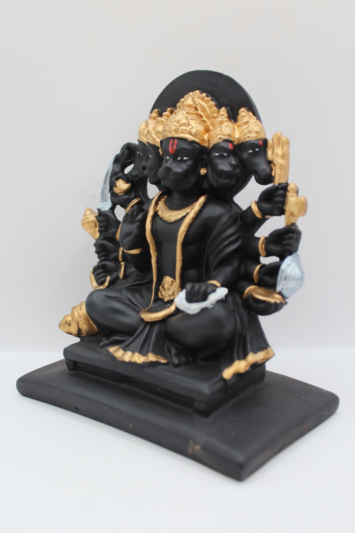 Black and gold resin Panchmukhi Hanuman murti, right side view
