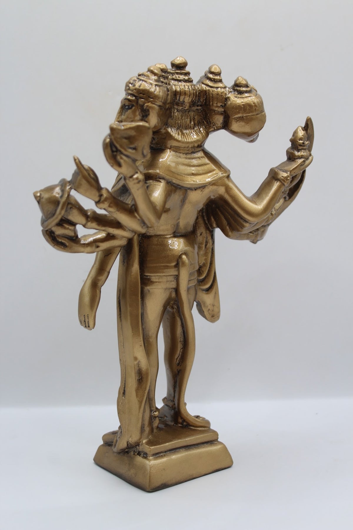 Antique gold resin Panchmukhi Hanuman murti, standing, back view