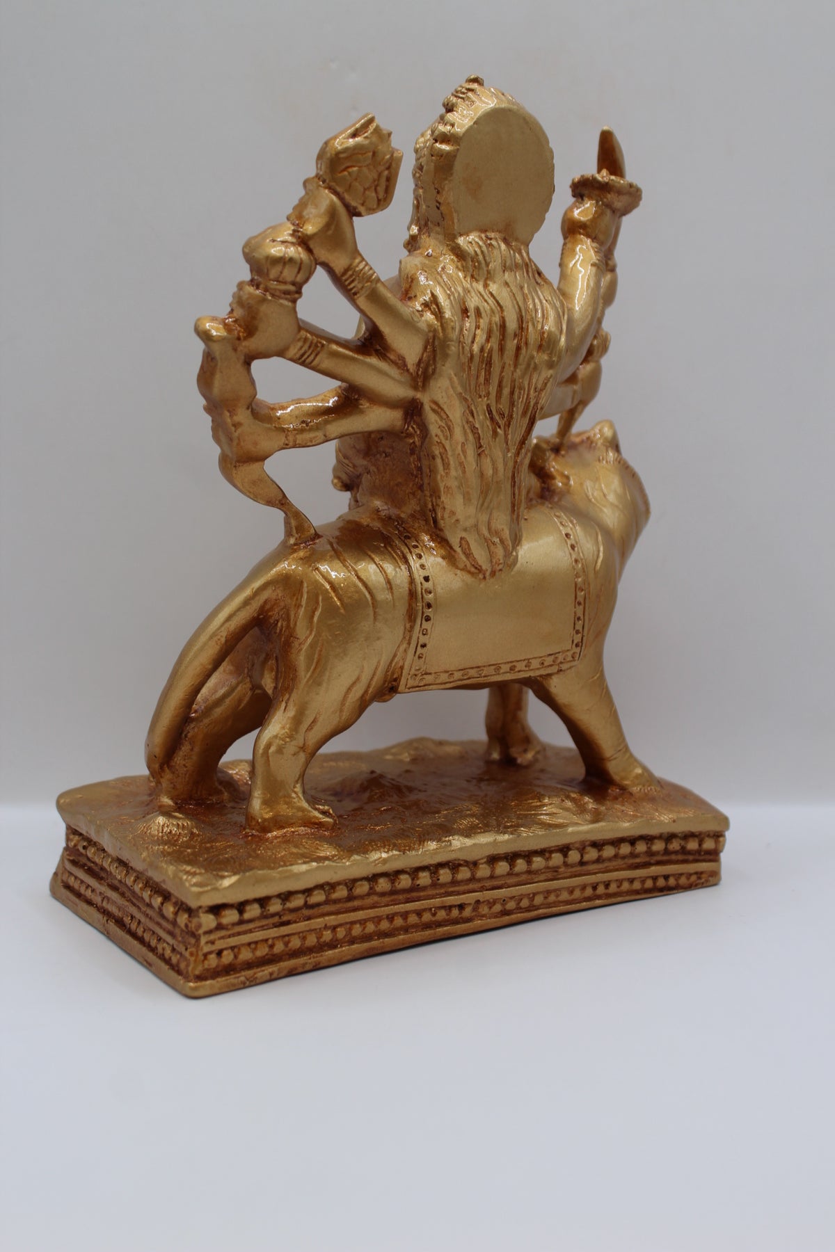 Resin Ambe Maa statue, golden finish, flat base, back view