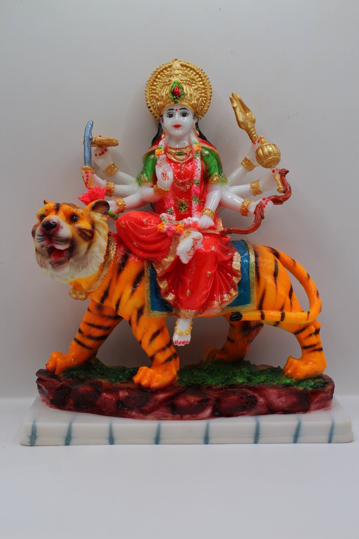 Resin Ambe Maa statue, red dress on tiger, white base, front view