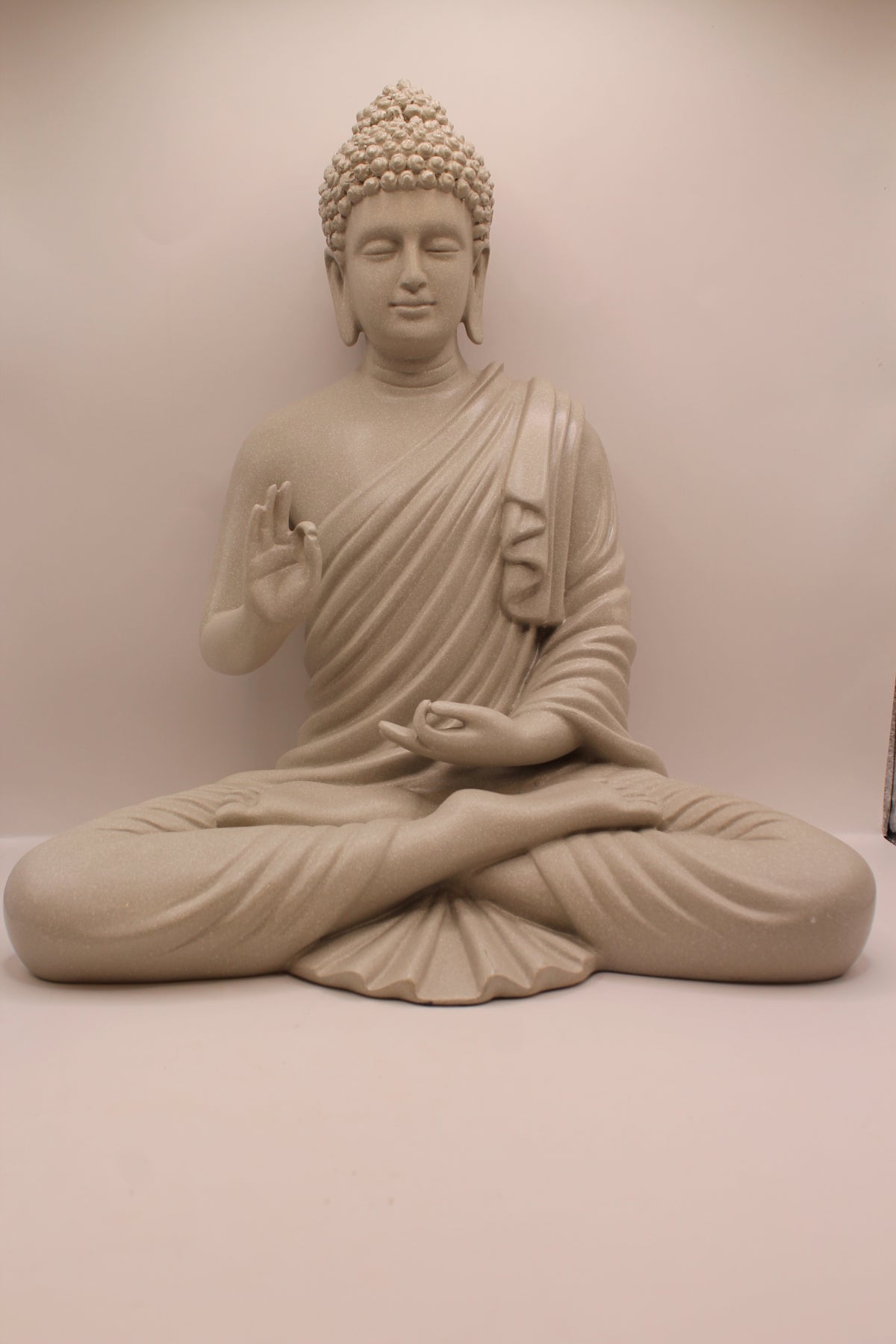 Grey speckled resin Buddha statue, front