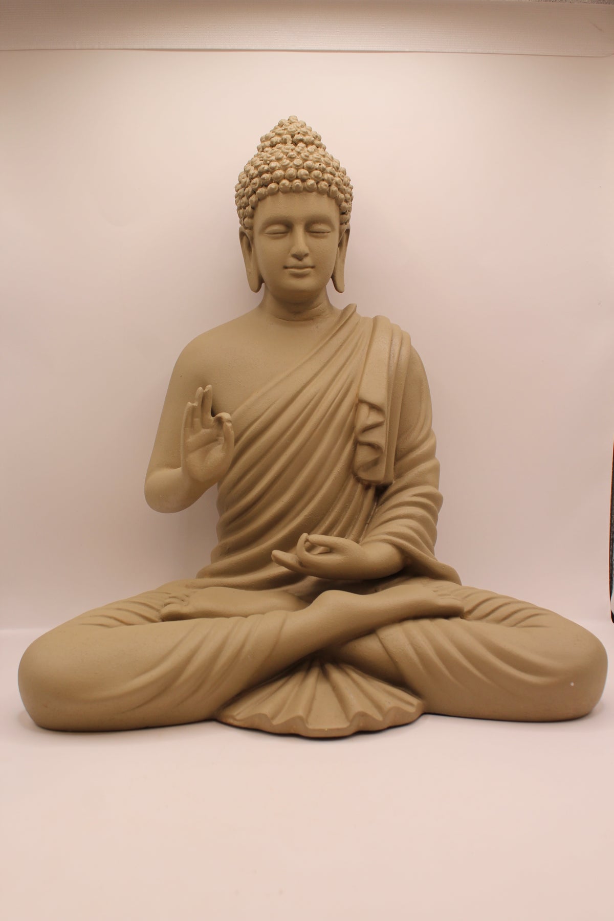 Light greige resin Buddha statue, front