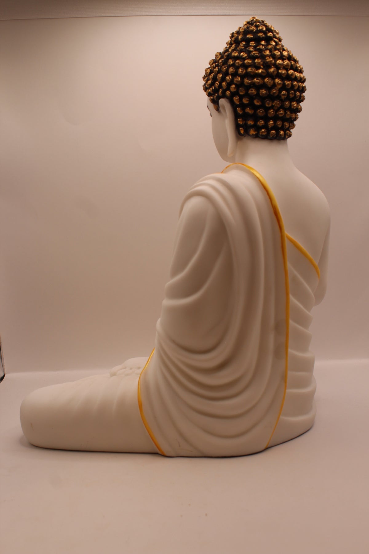 Matte white Buddha statue, back
