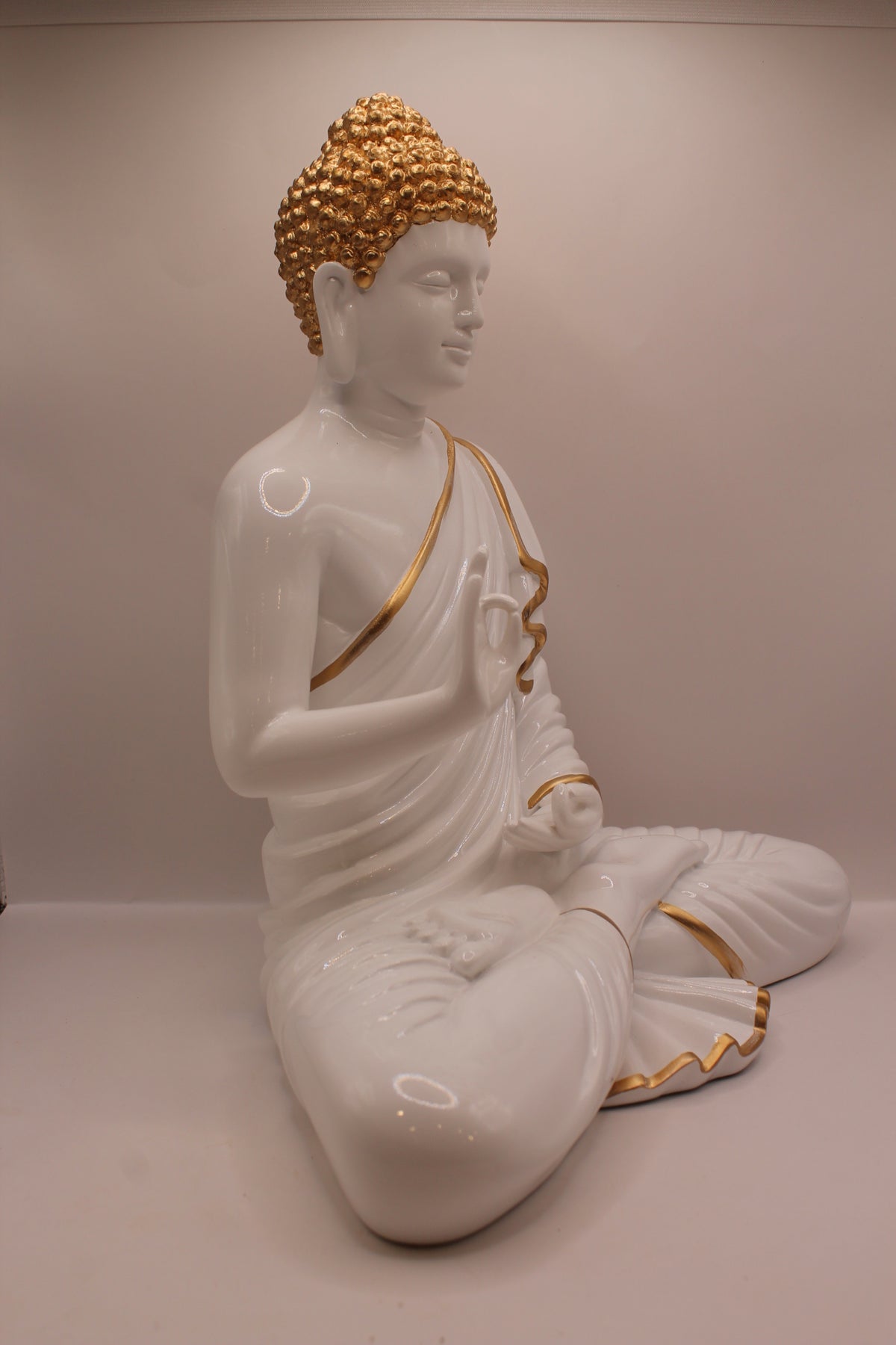 White Buddha statue, left side