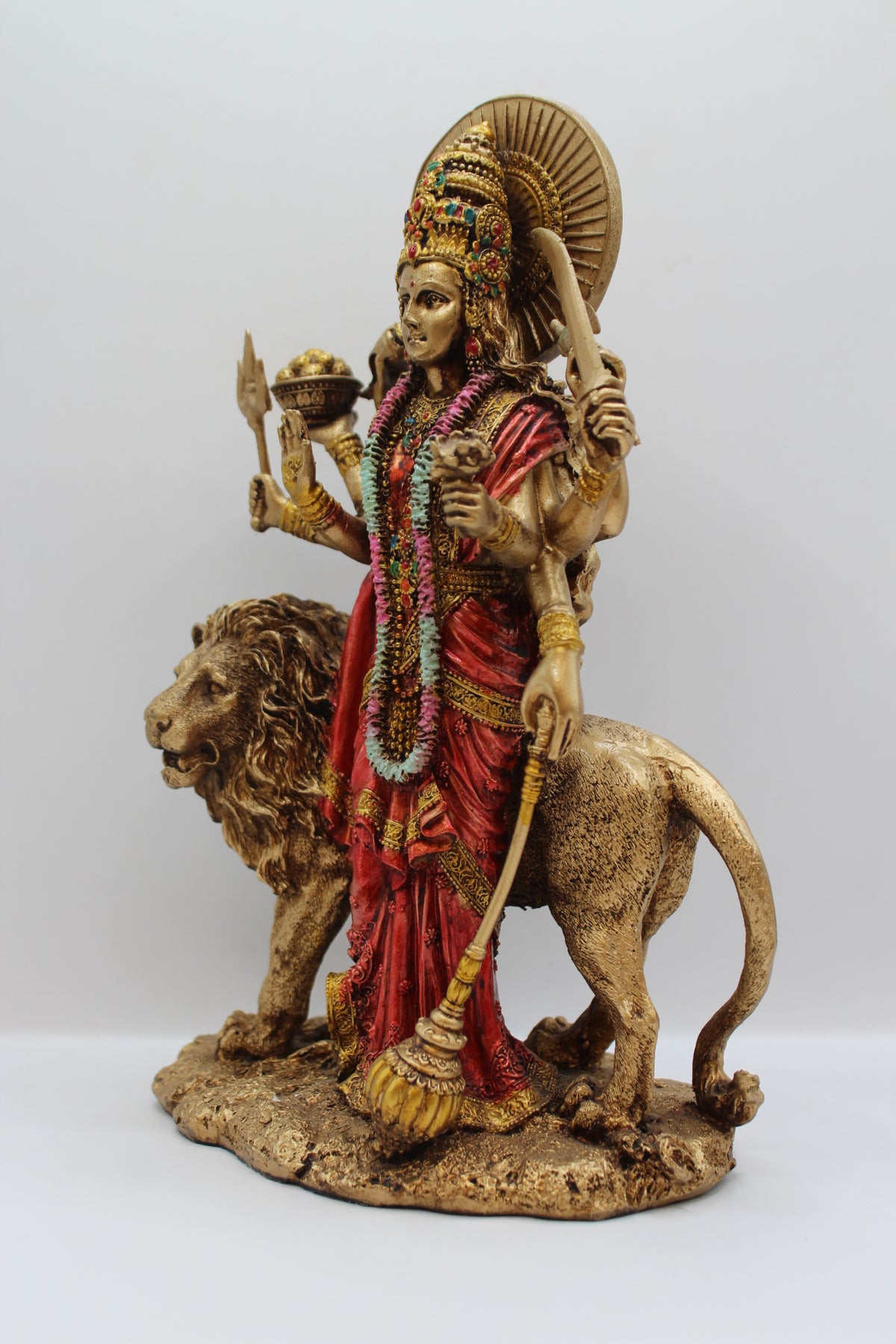 Resin Durga Maa statue, standing with lion, antique bronze, right side view