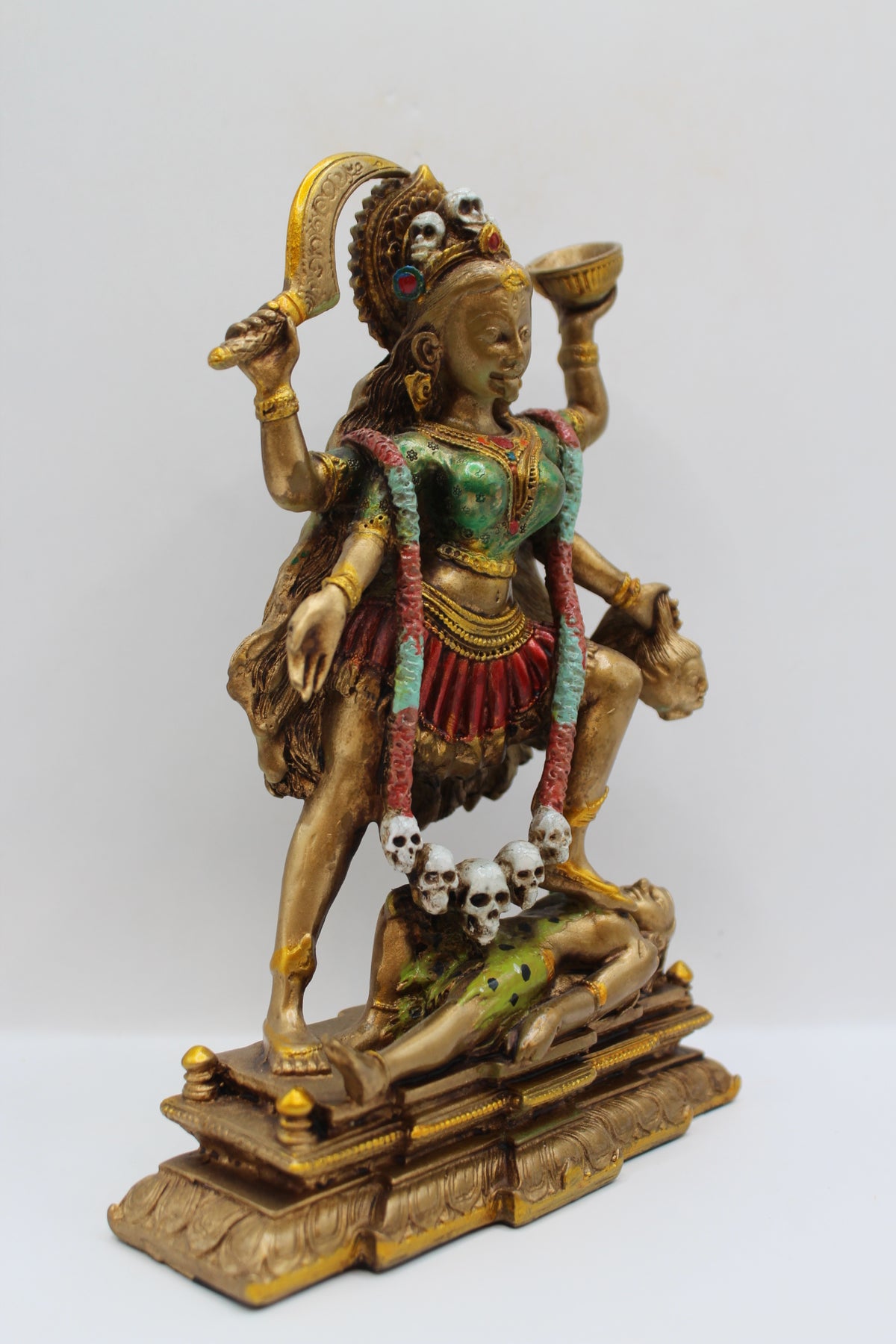 Resin Kali Mata statue, antique bronze finish, left side view