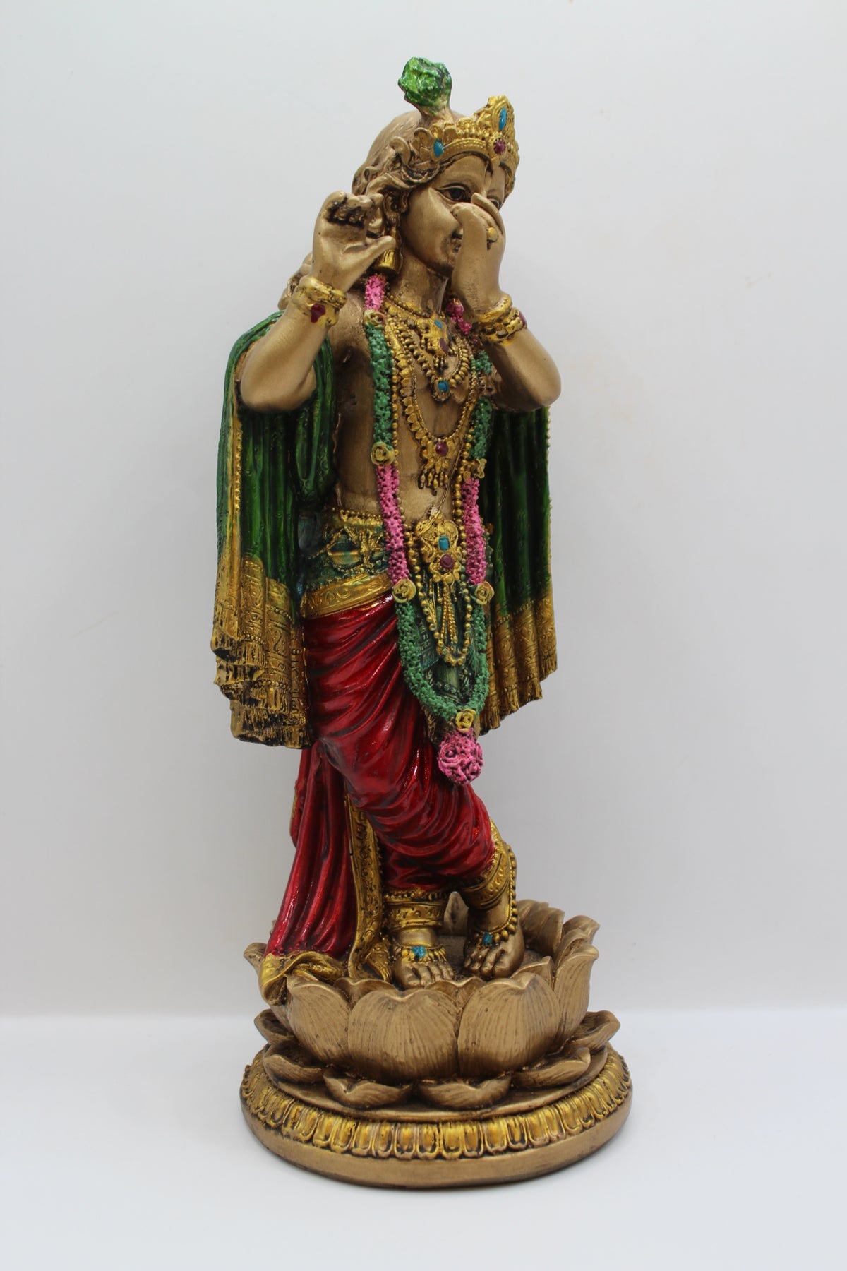 Resin Krishna statue, standing on lotus, antique bronze, left side view