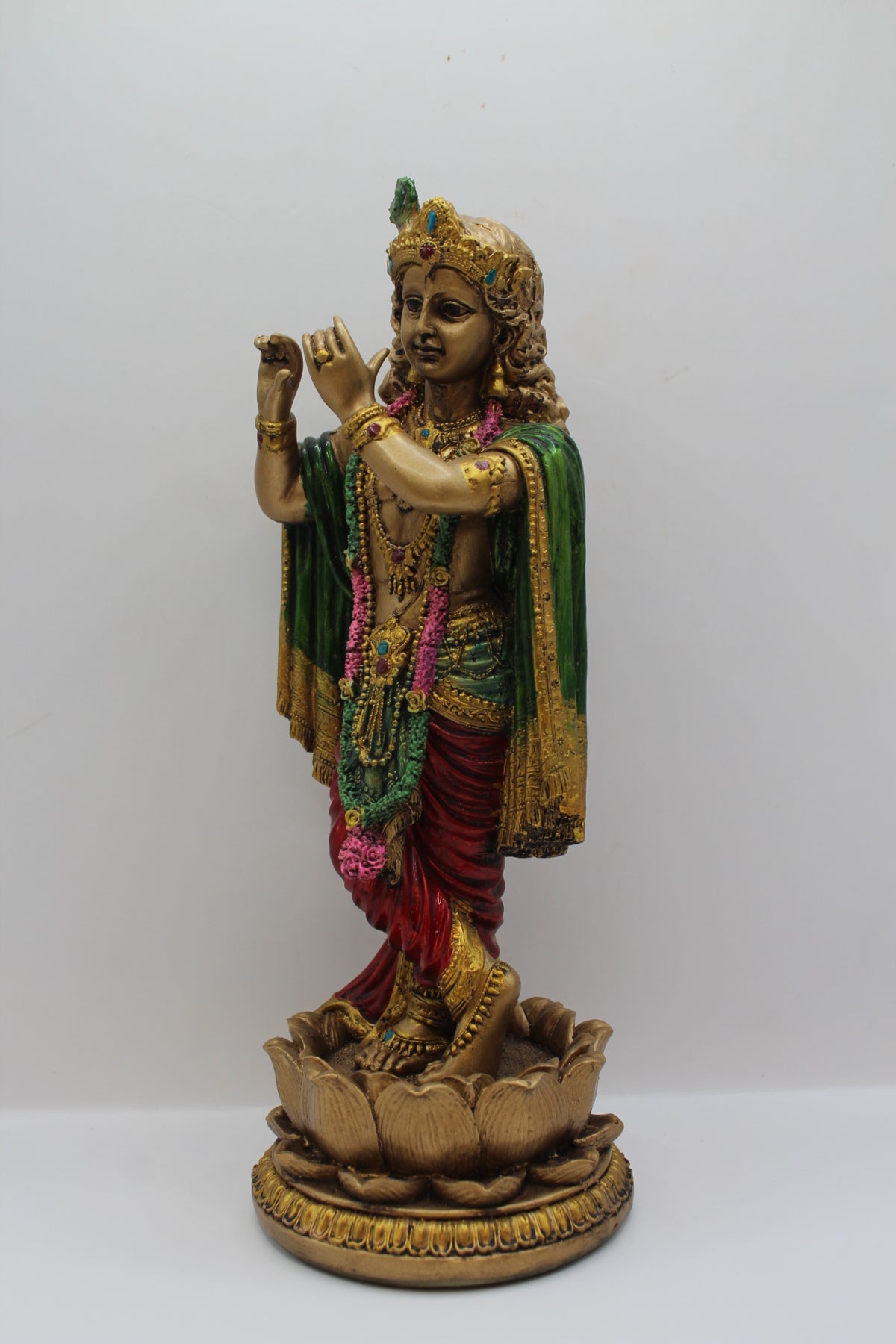 Resin Krishna statue, standing on lotus, antique bronze, right side view
