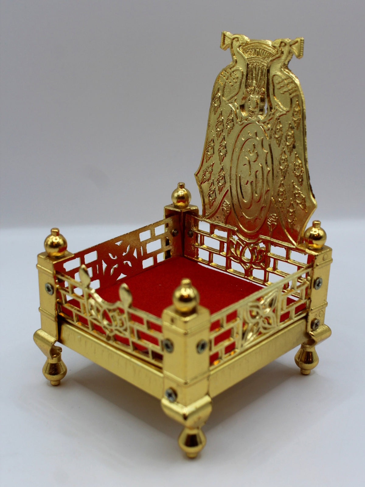 Gold metal sinhasan with red velvet seat, 9 x 9 x 15, side angle