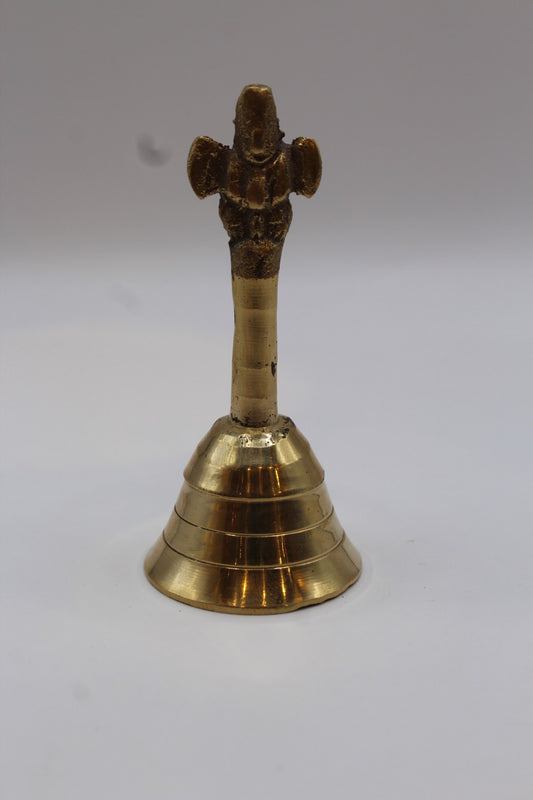 Solid brass pooja bell with a stepped skirt and cast handle