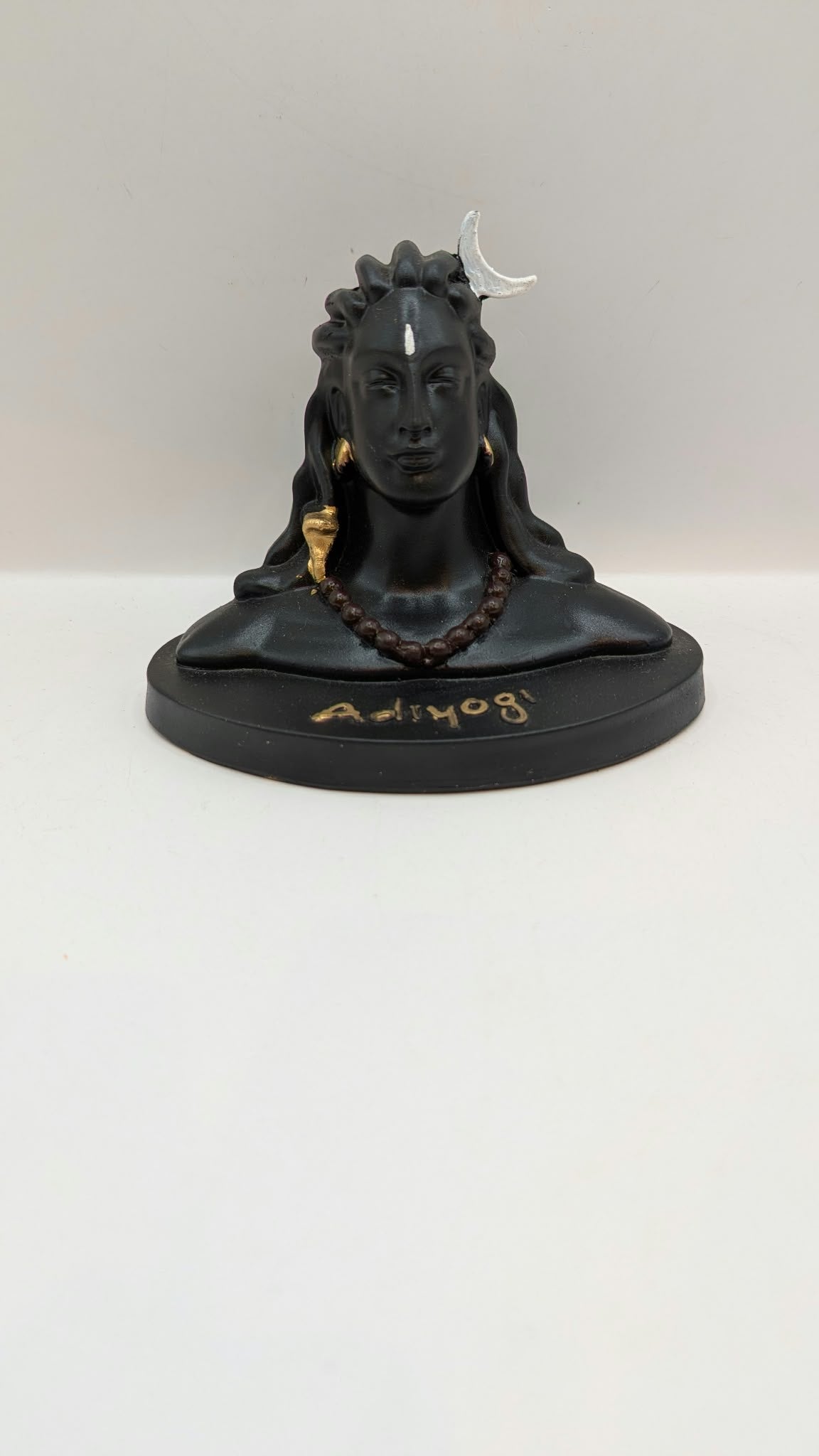 Black Adiyogi Shiva statue, front view