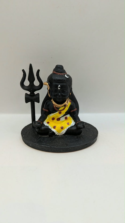 Small black sitting Shiva statue with trishul, front view