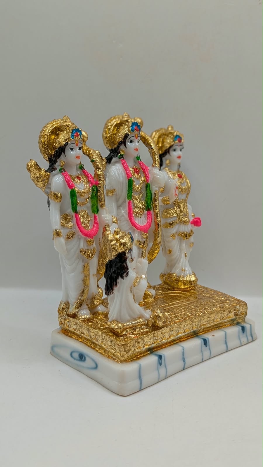 White and gold Ram Darbar statue, side view