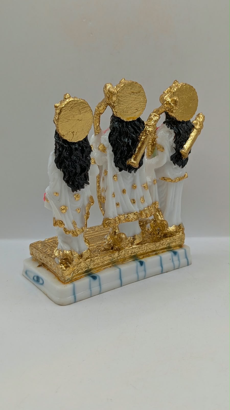 White and gold Ram Darbar statue, back view