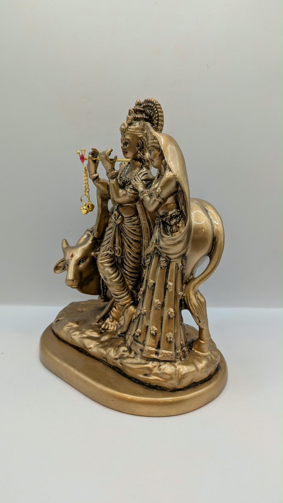 Antique gold Radha Krishna with cow statue, other side view