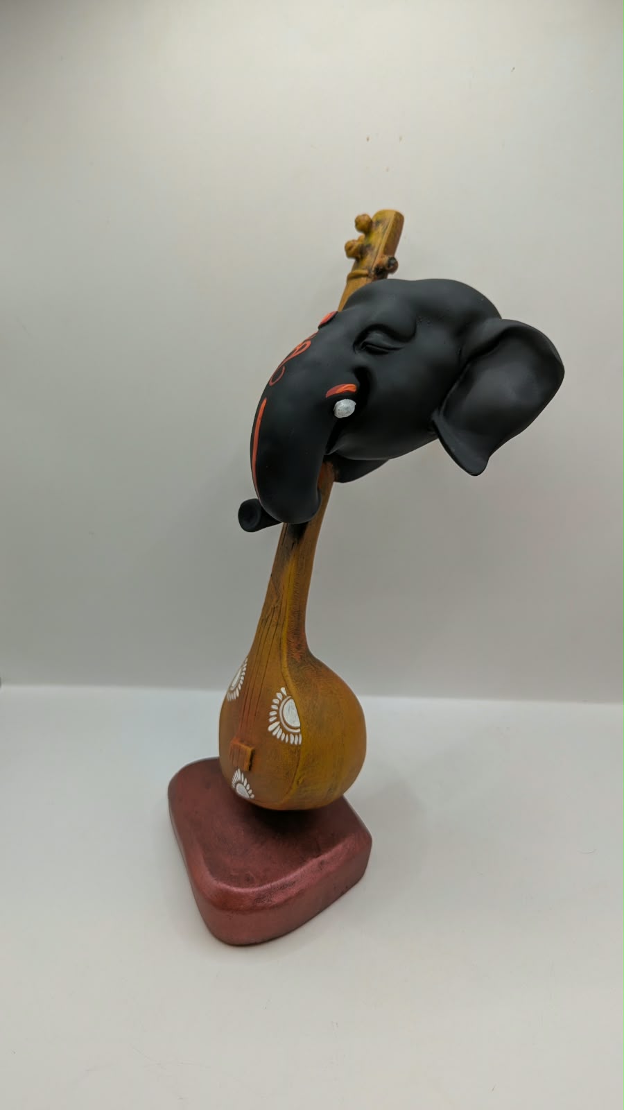 Ganesh head on veena statue, other side view