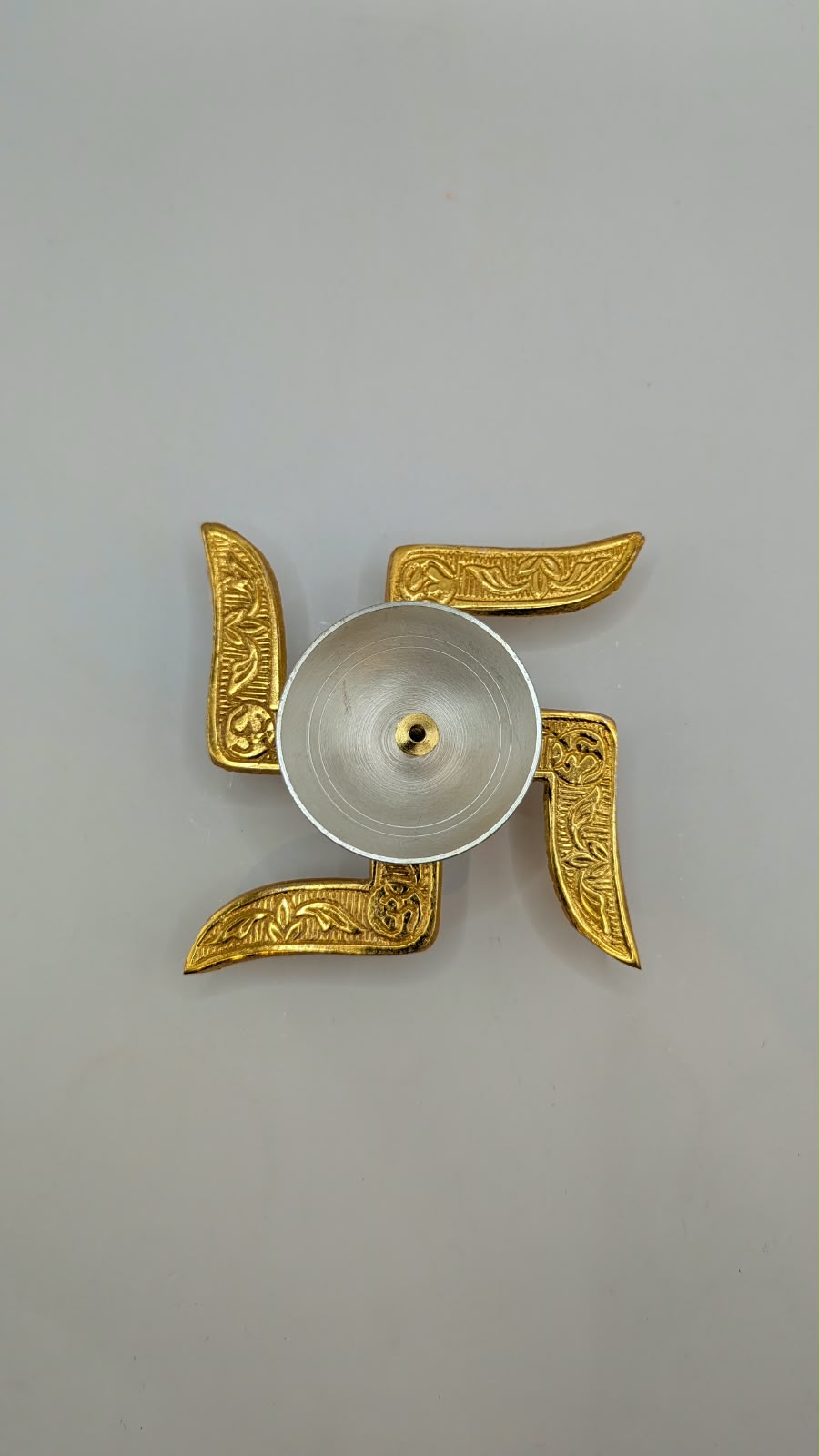 Gold and silver swastik diya, another view