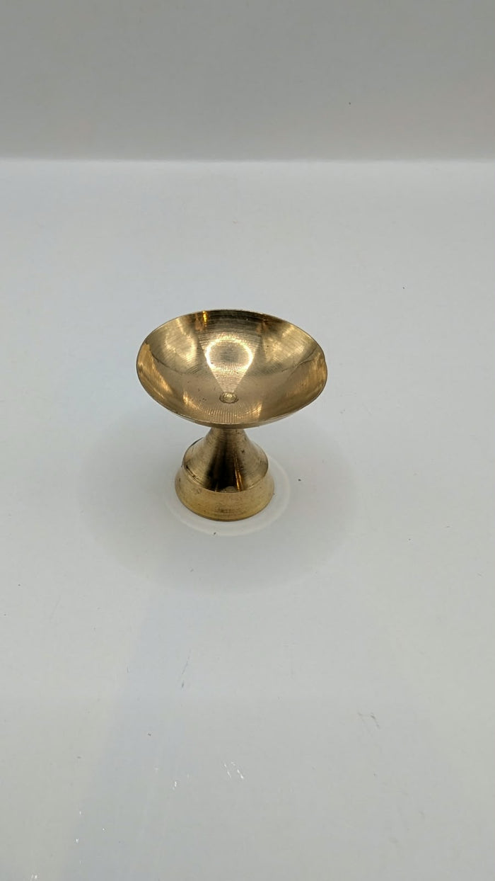 Mini metal diya on stand, front view