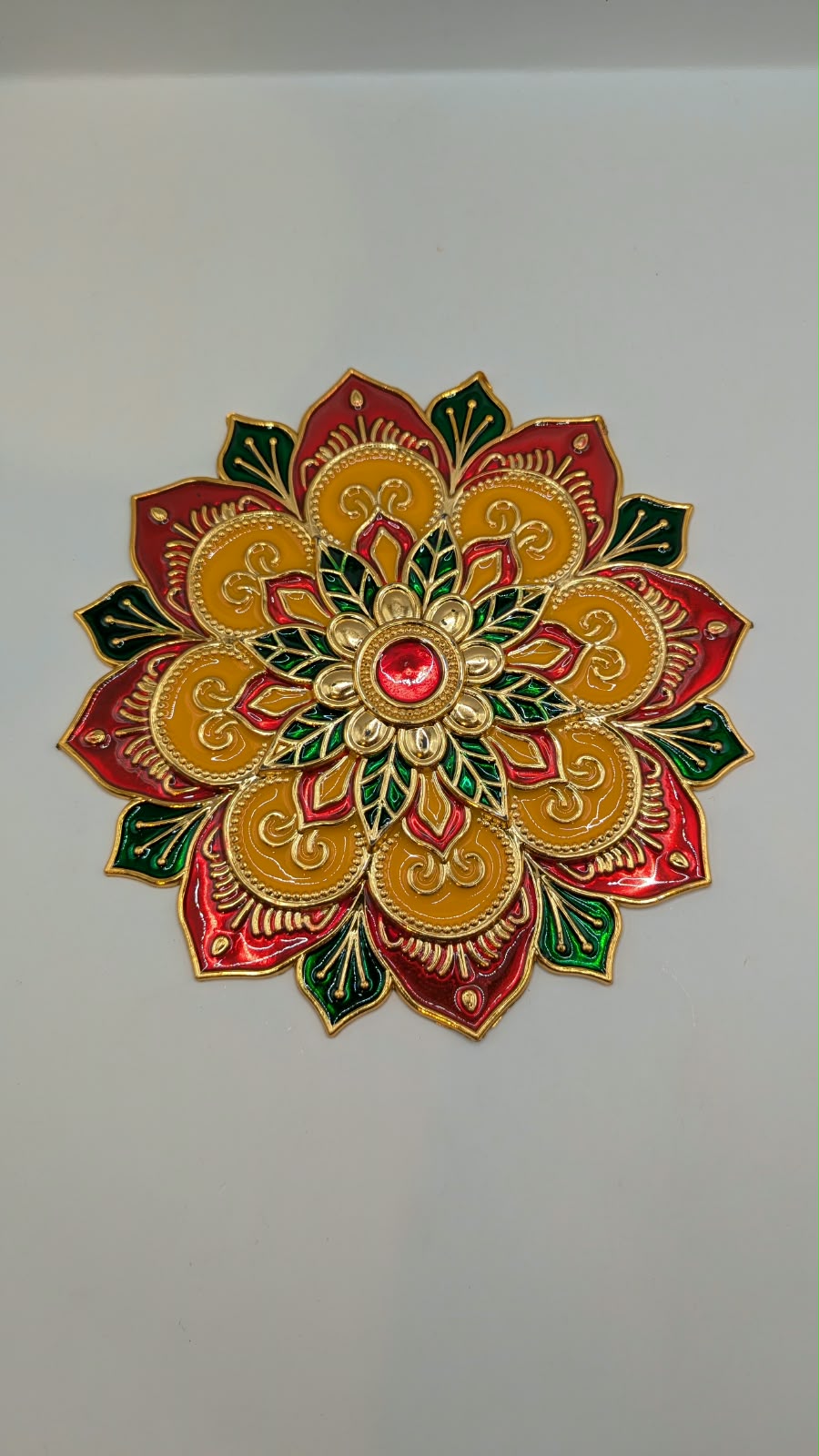 Meenakari flower rangoli, front view