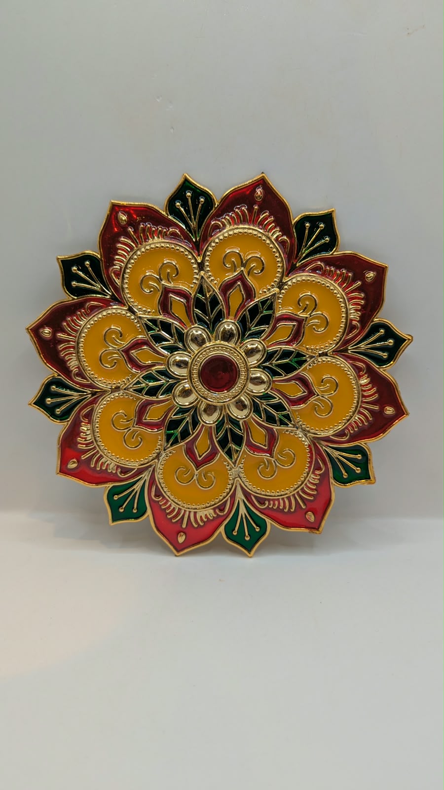 Meenakari flower rangoli, gold back view