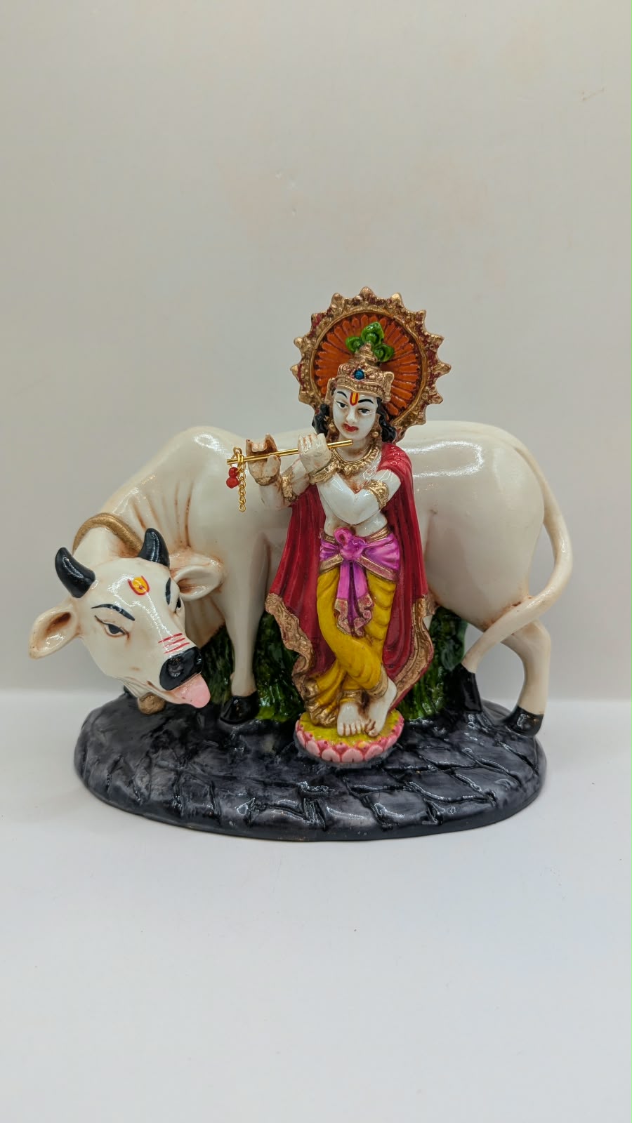 Krishna with white cow statue, front view