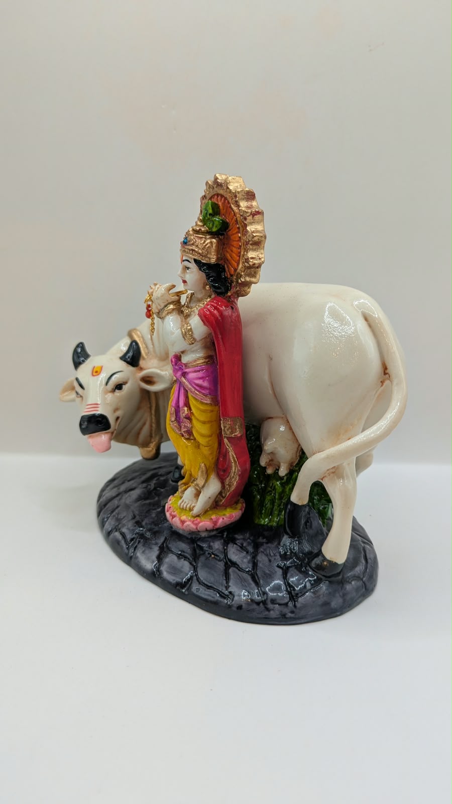 Krishna with white cow statue, other side view
