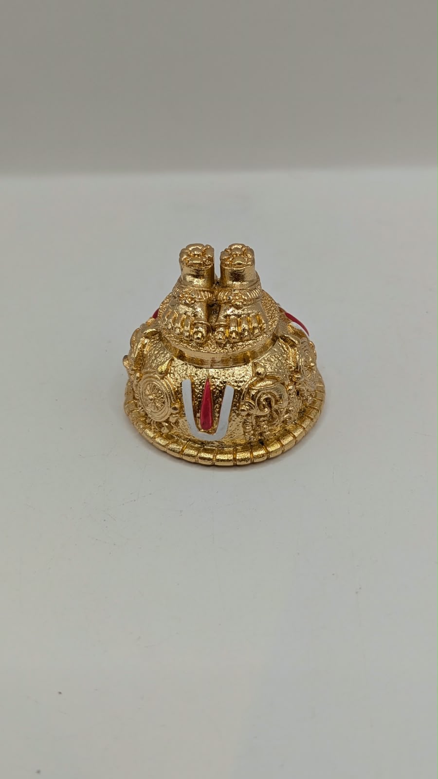 Gold Balaji charan paduka (holy feet), front view