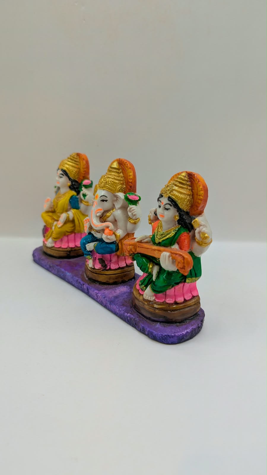 Colourful Laxmi Ganesh Saraswati statue set, other side view