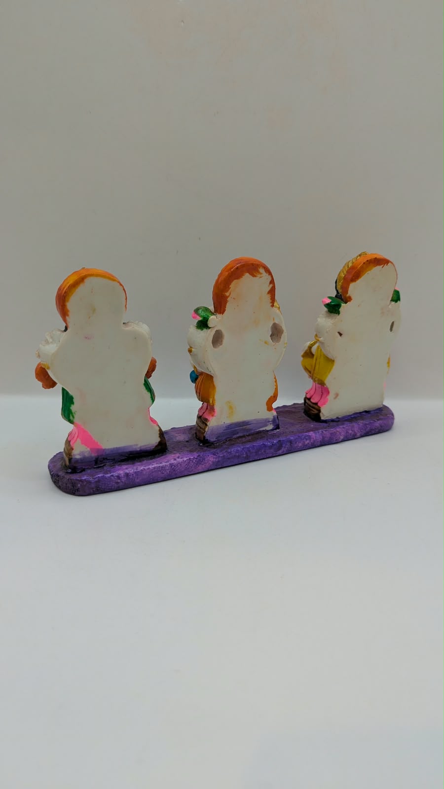 Colourful Laxmi Ganesh Saraswati statue set, back view
